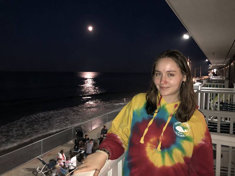 [ Abby on our balcony overlooking Wells Beach ]